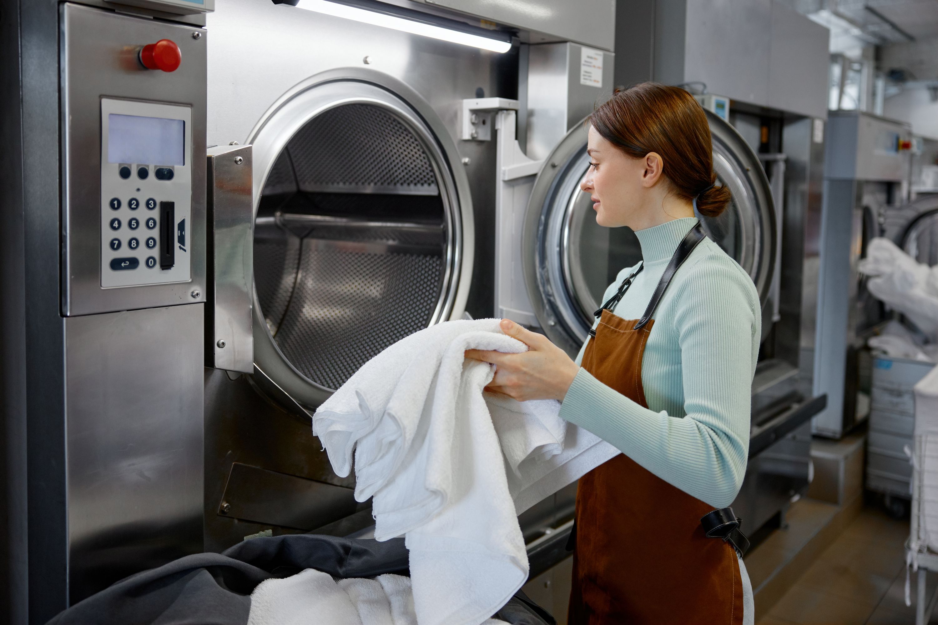 Laundry Worker Shutterstock 2700671437