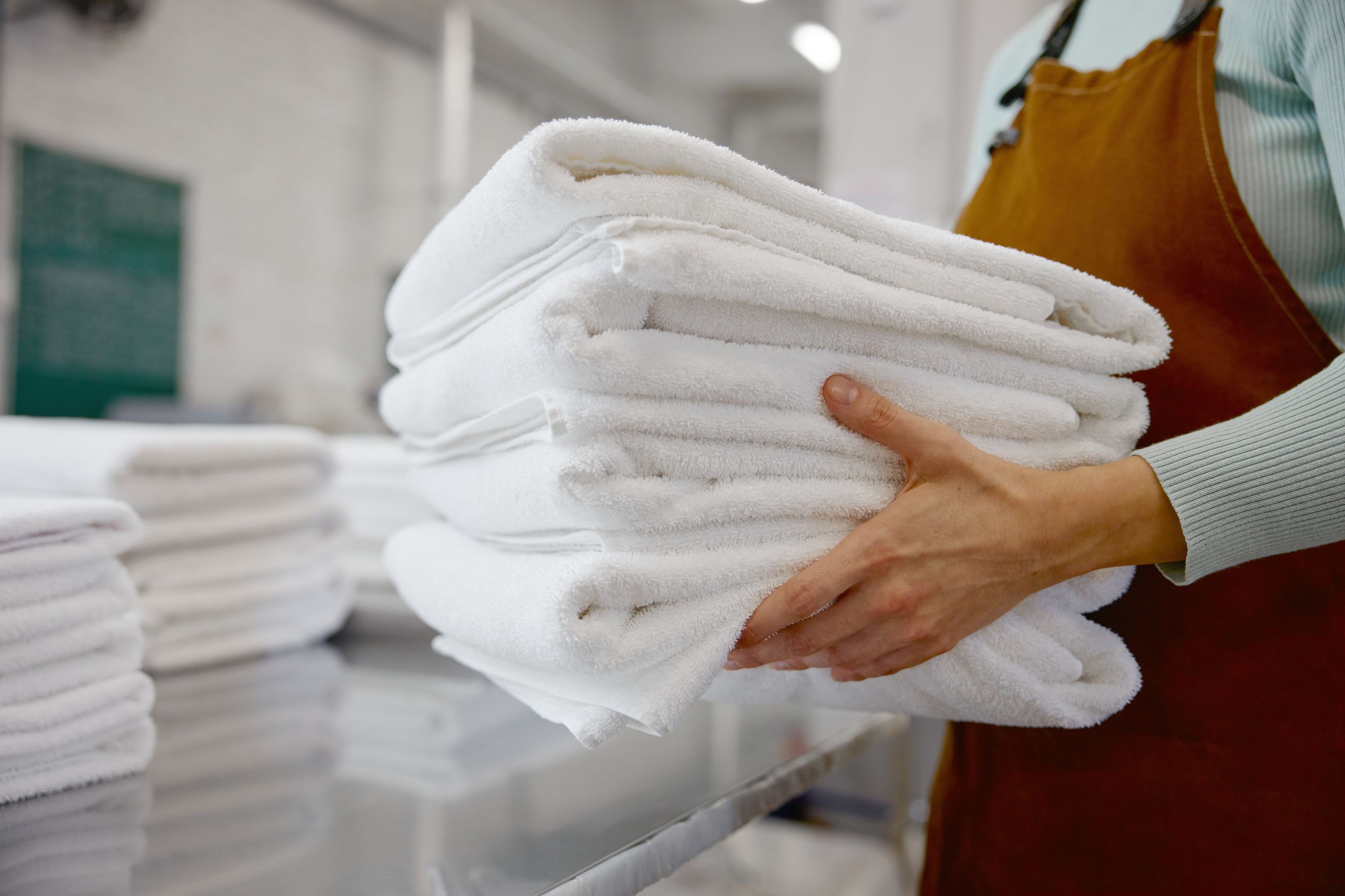 Laundry Worker Shutterstock 2700671411